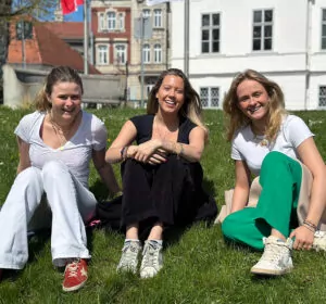 three-ib-students-sitting-in-the-capus-park